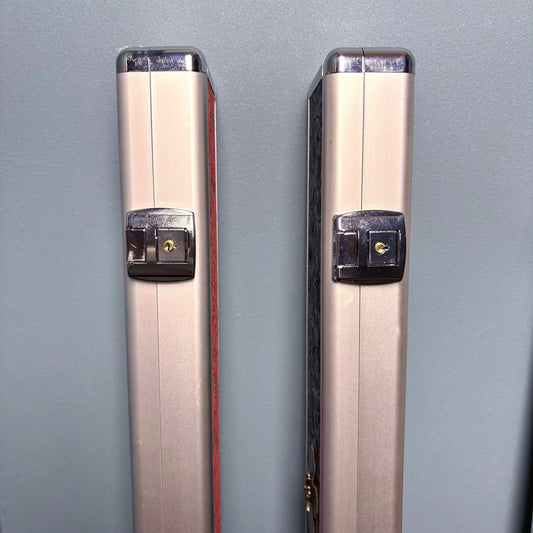 Two one piece cues and one Jump CUE CASE